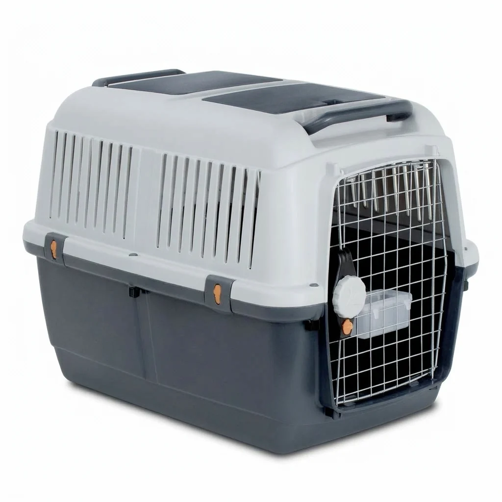 A rigid IATA-approved plastic travel crate with a metal door and side ventilation