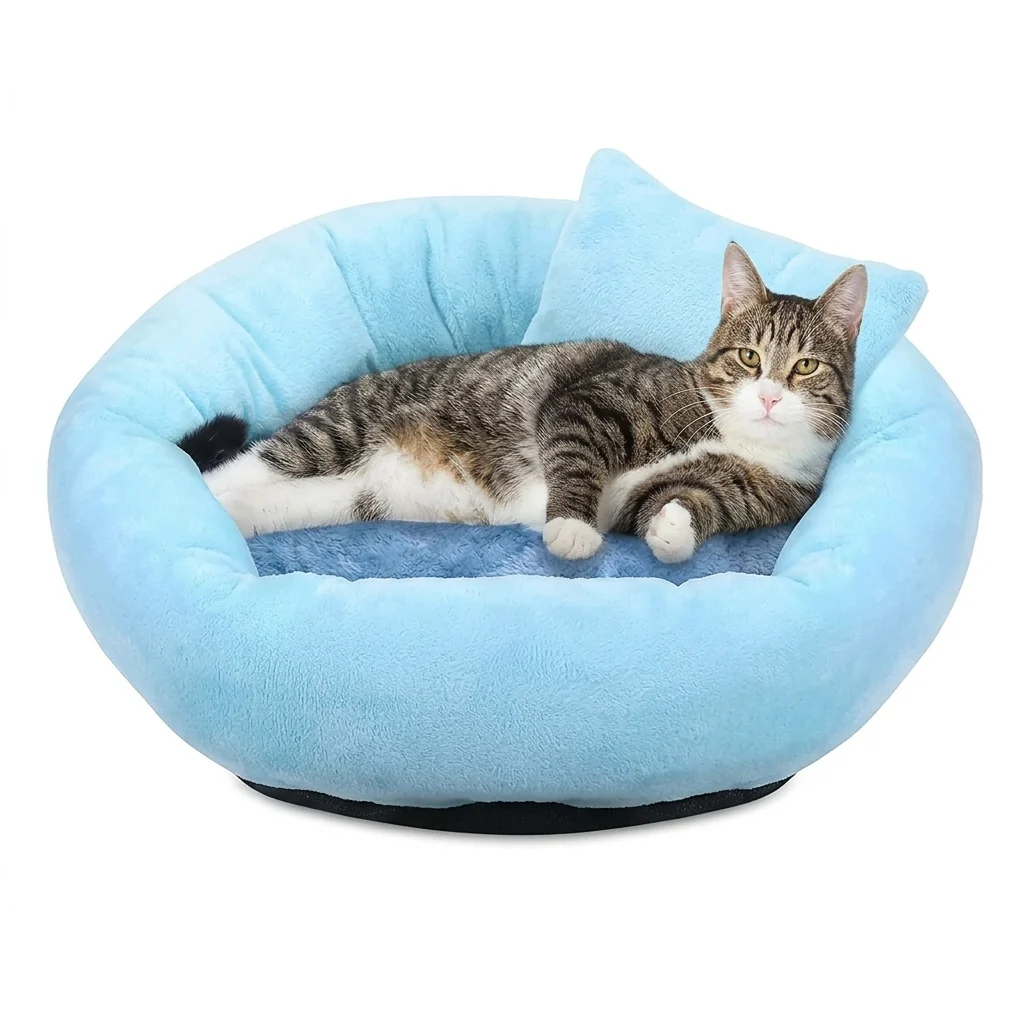 A soft round pet bed with a raised rim, two cats curled up in it