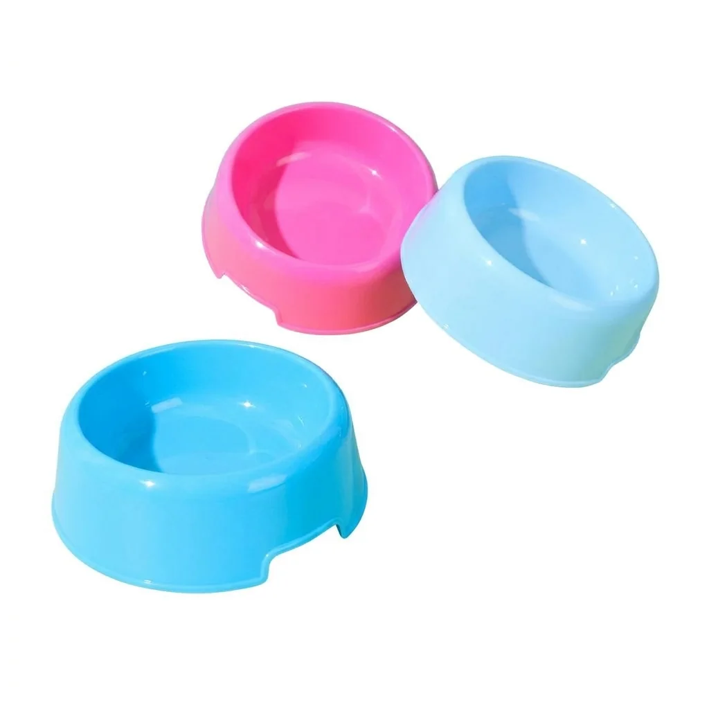 A set of lightweight plastic feeding bowls in pink and blue